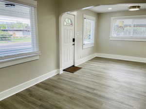 Living area, new paint, new vinyl LVP flooring, new windows and new lights