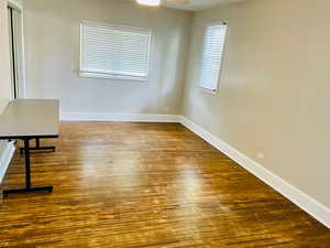Large bedroom with hardwood floor and spacious closet