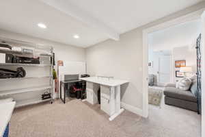 Office space featuring light carpet, recessed lighting, and baseboards