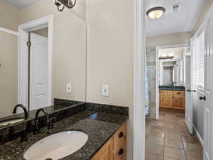 Large Jack & Jill full bathroom with separate sinks for each bedroom