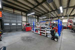 Garage featuring a workshop area
