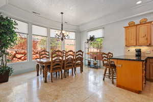 Dining room with a chandelier