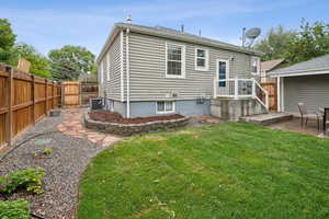Back of property featuring a patio area and central air condition unit