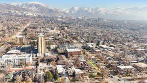 Aerial view of property's location featuring a mountain backdrop