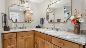 Bathroom featuring double vanity