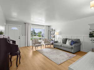 Living room with light wood-style floors