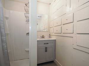 Unit 1 main floor bathroom with individual drawers and cabinets