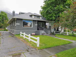 Side driveway to back yard designated parking spaces