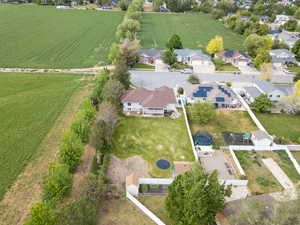 Aerial view of property's location featuring nearby suburban area
