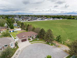Aerial view of residential area featuring a mountain backdrop