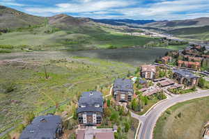 Crestviewf Condominum complex Aerial overview featuring majestic mountain views  of the Wasatch Range, just 2 mile trail ride from Park City's Olympic Park on Park CIty's Trail System and convenient commuter location within 25 minutes of Salt Lake CIty's