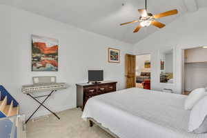 Bedroom featuring new grey traffic master carpet, ceiling fan, and 8'x7' Walk In Closet