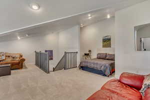 Large Loft with Den and Office. 25' x 23' Vaulted ceilings  new textured carpet with recessed lighting.