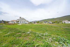 View of yard with a mountain view