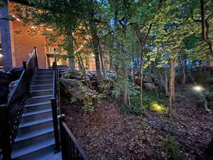 View of yard featuring stairs