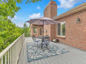 Wooden terrace with outdoor dining space
