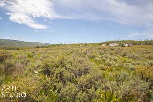 View of undeveloped land featuring mountains