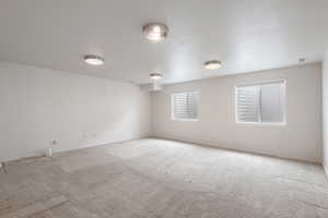 Primary bedroom size with mutliple windows and located in the basement