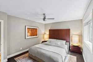 Bedroom featuring baseboards and a ceiling fan