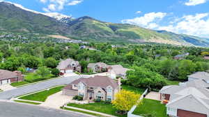Aerial view of residential area with mountains