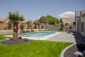 View of pool featuring a patio area and a mountain view