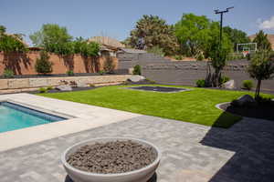 View of yard with a patio