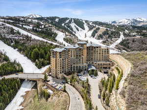 Snowy aerial view featuring a mountain view