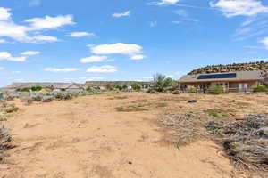 View of yard featuring fence