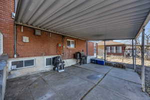 View of patio / terrace with fence and area for grilling
