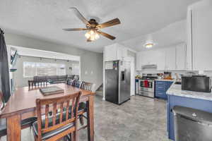 Kitchen featuring appliances with stainless steel finishes,