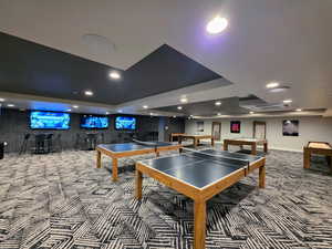 Recreation room featuring carpet floors, billiards, wet bar, recessed lighting, and baseboards