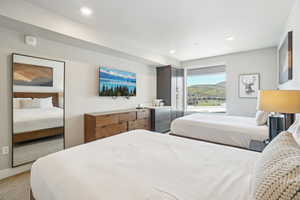 Bedroom with recessed lighting and carpet floors
