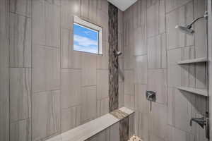 Bathroom with tiled shower