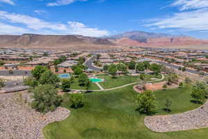 Aerial view of residential area with a mountain backdrop
