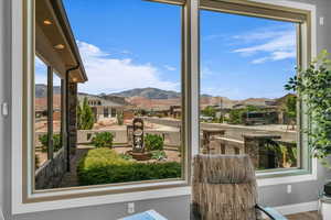 Detailed view of a mountain view, baseboards, and a residential view