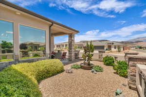 View of yard with a patio area, a residential view, and a mountain view