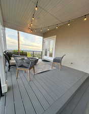 Deck at dusk with french doors