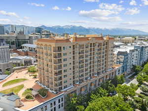 View of apartment building / complex featuring a mountain view