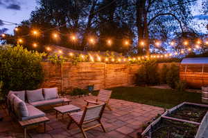 View of patio / terrace featuring outdoor lounge area, a fenced backyard, and a garden