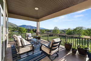 View of patio featuring a mountain view and an outdoor hangout area