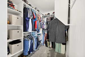 Spacious closet featuring carpet