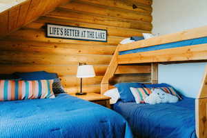 Bedroom with log walls