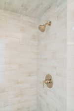 Bathroom view of a tile shower