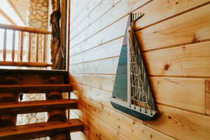 Staircase with wood walls