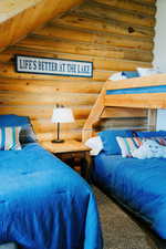 Bedroom with log walls