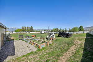 View of yard featuring a mountain view and a garden