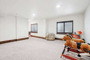 Playroom featuring baseboards, carpet flooring, and recessed lighting