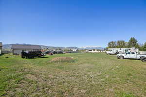 View of yard with a mountain view
