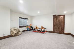 Rec room featuring carpet floors, baseboards, and recessed lighting