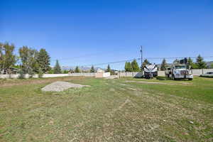 View of yard with a shed